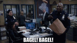 Raymond Holt With Team Having Bagel GIF