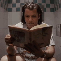 Reading A Book At The Toilet GIF