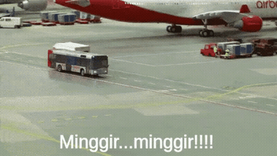 Red Airbus Towed By Bus On Tarmac GIF