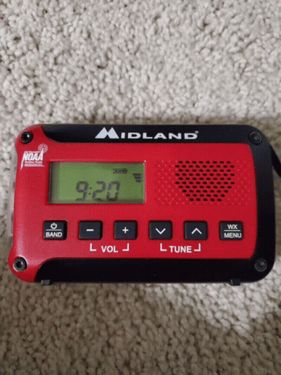 Red And Black Midland Radio Displaying 9:20 GIF