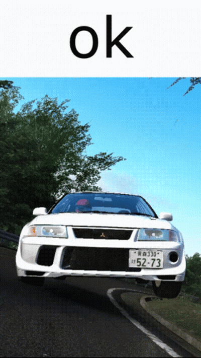Red And Blue Cars In Front Of Stocktrain Container GIF