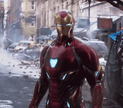 Red And Gold Iron Man Standing On Street GIF