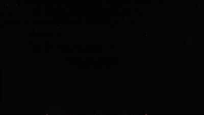 Red And Green Fireworks Display GIF