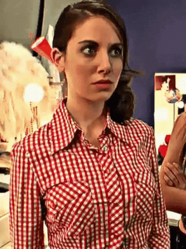 Red And White Checkered Shirt Woman Looking Camera GIF