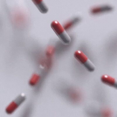 Red And White Pills Falling From Sky GIF