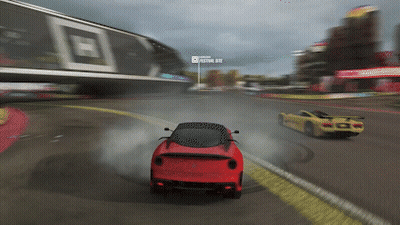Red And Yellow Cars With Festival Site Sign GIF