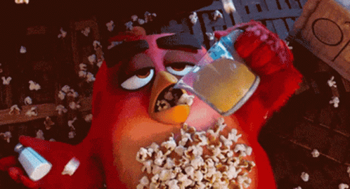 Red Angry Bird Eating Popcorn Holding Mustard GIF