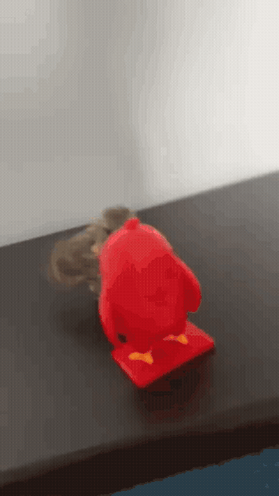 Red Angry Bird Toy Next To Mouse GIF