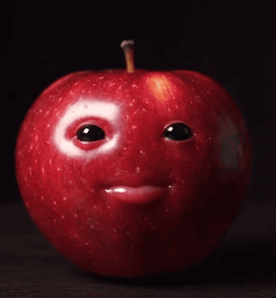 Red Apple With Face And Bite GIF