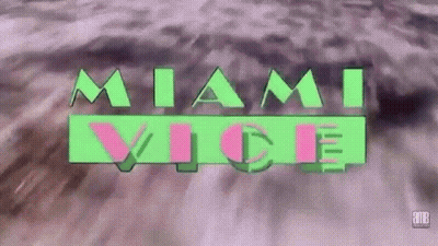 Red Bead Letter T On Black GIF