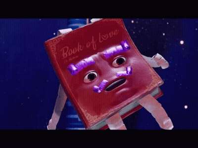 Red Book With Face Saying Book Of Love GIF