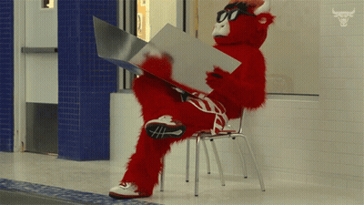 Red Bull Mascot Reading A Book GIF