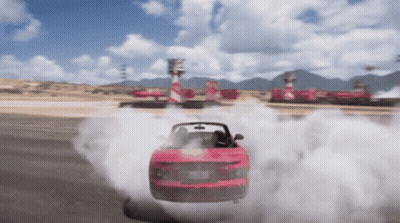 Red Car Drifting With Tire Smoke GIF
