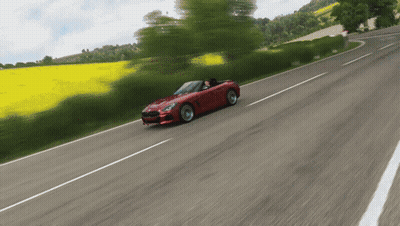 Red Car Driving Down Country Road GIF