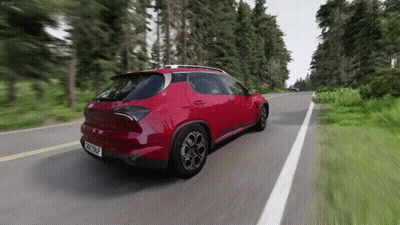 Red Car Driving Down Road With Trees GIF