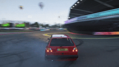 Red Car Driving On Race Track Saying Driving Elite GIF