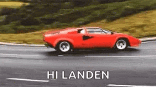 Red Car Driving With Hi Landen GIF