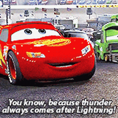 Red Car From Cars Driving On Race Track GIF