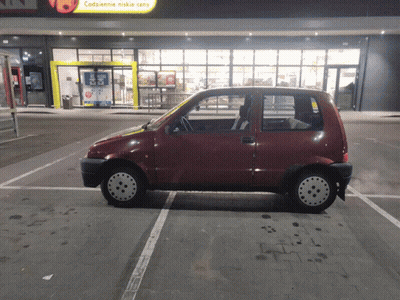 Red Car Parked At Codziennie Niskie Ceny GIF
