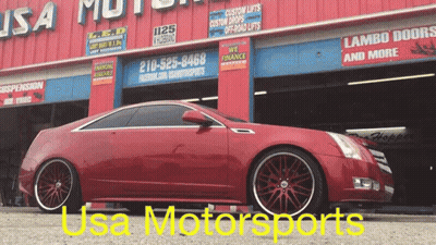 Red Car Parked Outside USA Motorsports GIF