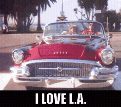 coche rojo diciendo i love l.a GIF