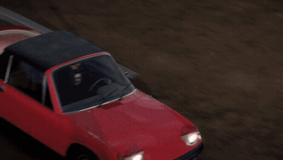 Red Car With Black Roof Driving GIF