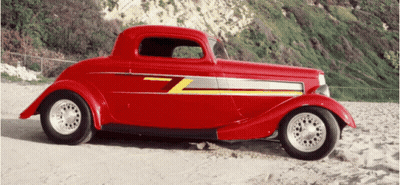 Red Car With Letter Z On Sandy Beach GIF
