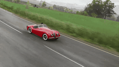 Red Car With License Plate YC6N888 Driving Down Street GIF