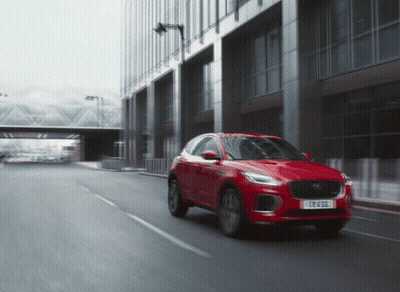 Red Car With License Plate YC6N888 Driving Down Street GIF