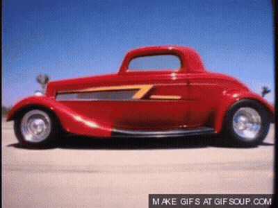 Red Car With Yellow Stripe Says Make Gifs At Gifsoup.com GIF
