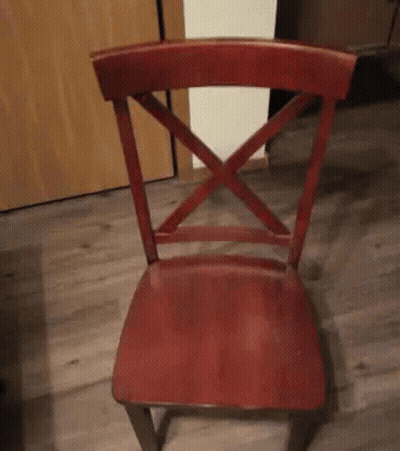 Red Chair On Wooden Floor GIF