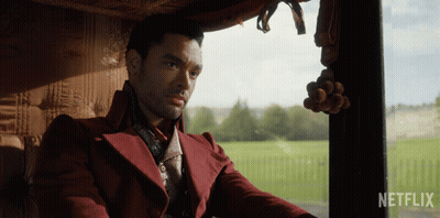 Red Coat Man In Car Netflix Logo GIF