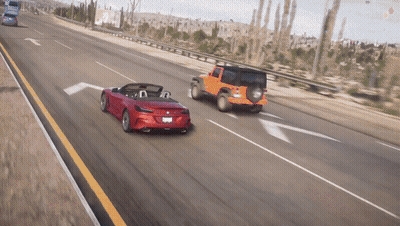 Red Convertible Driving Beside Jeep GIF