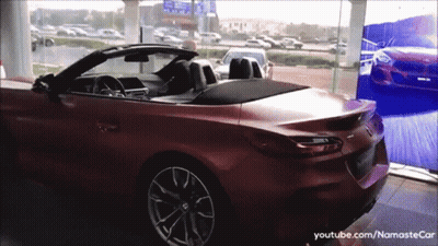 Red Convertible In Showroom With YouTube NamasteCar GIF