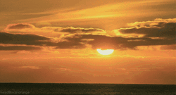 Red Dawn Passing Clouds GIF