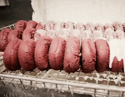 Red Donuts With White Frosting GIF