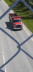 Red Dump Truck On The Road GIF