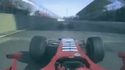 Red Ferrari Driving On Race Track GIF
