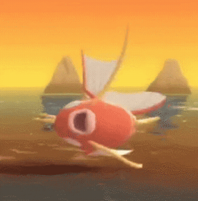 Red Fish With White Tail Swimming GIF