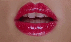 Red Glossy Lips Blowing Kisses GIF