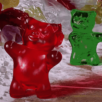 Red Gummy Bear Next To Green Bear GIF