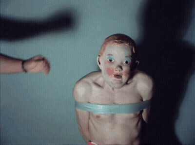 Red Hair Boy Tied Up With Tape GIF
