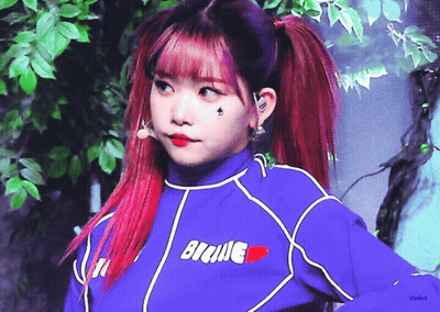 Red Hair Girl In Blue Shirt Saying Bickie GIF