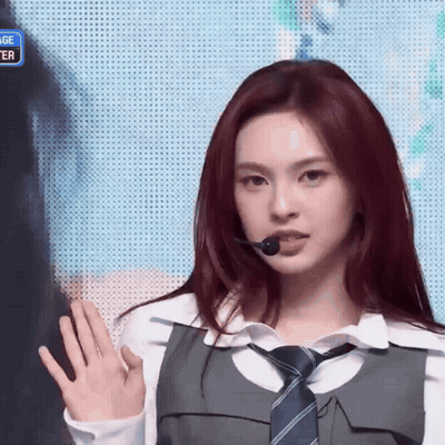 Red Hair Girl With Tie And Microphone GIF