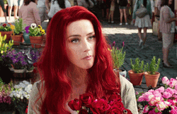 Red Hair Giving Flowers GIF