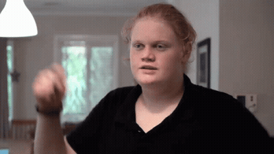 Red Hair Man in Black Shirt Making Funny Face