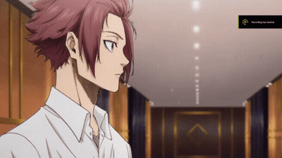 Red Hair Man In White Shirt In Hallway With Recording Button GIF
