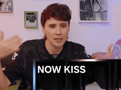 Red Hair Man Sitting At Computer Saying Now Kiss GIF