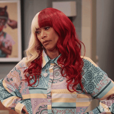 Red Hair Woman Wearing Be Shirt GIF