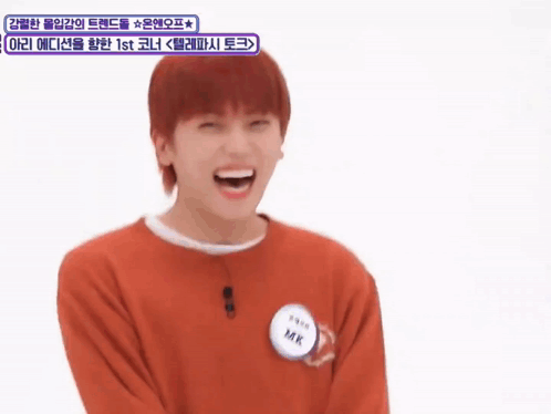 Red-Haired Boy Laughing With Mk Name Tag GIF